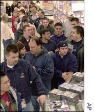 A long line of game buyers wait at a store in Burbank, Calif., to purchase the Nintendo GameCube on the first day it was available.