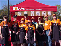 Kevin Jackson (second from right) with his family and employees.