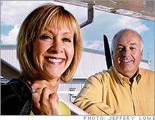 Early retirees: Pilot Keith Bruce and designer Sandy Peletier saved enough to retire and travel the world.