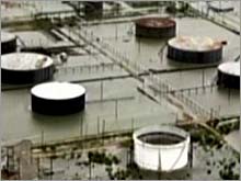 Oil tanks in Port Arthur, Texas, surrounded by flood waters from Hurricane Rita.