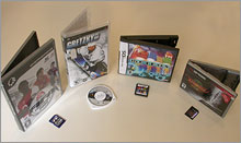 Note the size of the Gizmondo game cartridge and its retail packaging (along with competitors)