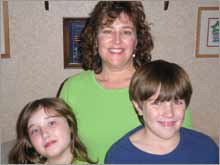 Clare Cheesman with two of her three kids, Kelly, 9 and Brian, 11.