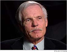 In an interview, outgoing Time Warner board member Ted Turner voiced both support and criticism of Time Warner policies.