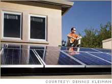 Green-themed investor Chris Vargas atop his solar-powered home in Los Altos Hills, Calif. 