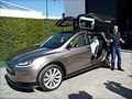 Tesla unveils its Model X SUV with 'falcon wings'