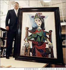 Sotheby's CEO Bill Ruprecht (with Picasso's 'Dora Maar with Cat').