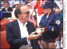 Baseball fans, from former Commissioner Fay Vincent to this young fan, seem willing to forgive baseball its various shortcomings.