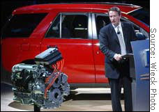 GM CEO Rick Wagoner unveils a hybrid gas-electric engine desinged to improve fuel efficiency in the Saturn SUV by 50 percent by late 2005.