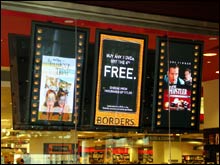 The Borders storefront in New York's Time Warner Center displays multiple digital displays.