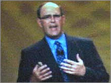 MCI CEO Michael Capellas, pictured here speaking at a conference in New York in 2003, would be wise to stick with Verizon's buyout offer.