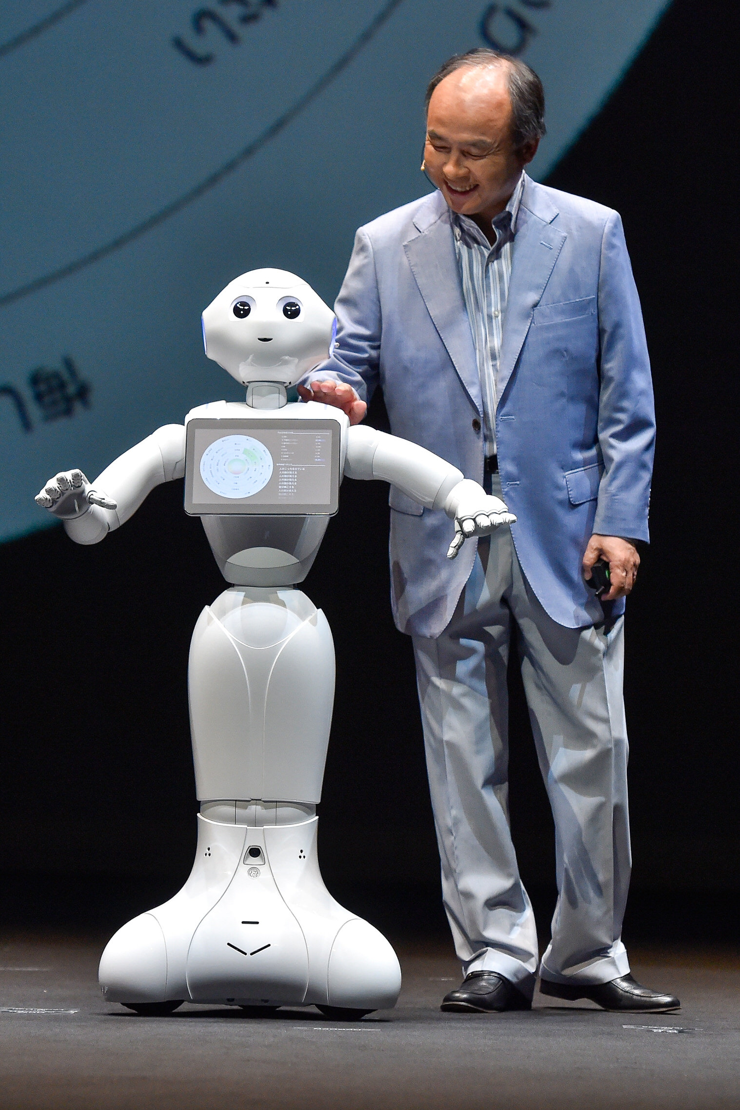 Son with Softbank’s humanoid robot, Pepper/Getty Images